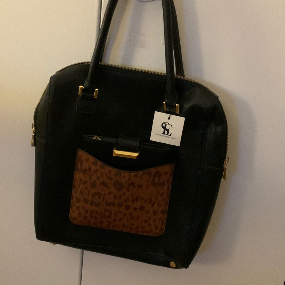 Women’s tote can fit a reader, or small laptop